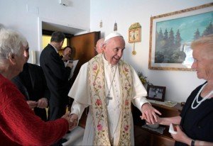 Pope Francis goes door to door, blessing homes in Rome suburb